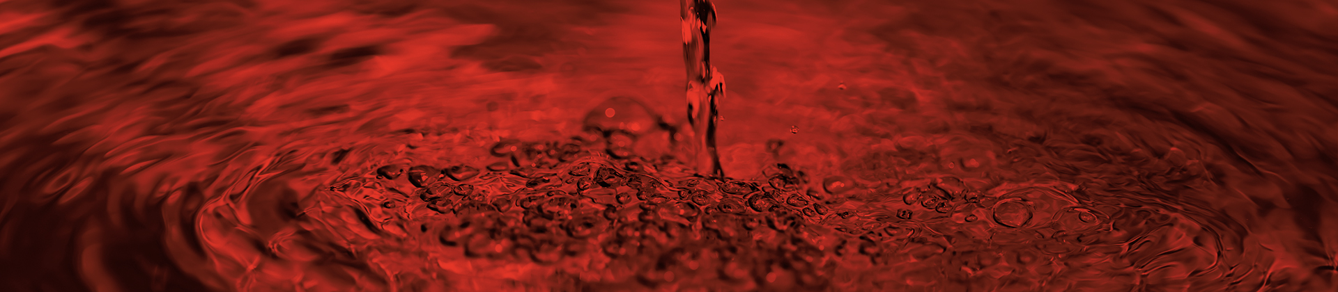 TrojanUVSpring banner water droplet with red overlay