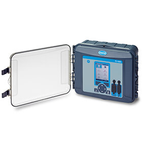 An open gray and blue Hach controller box showing a FL1500 stationary logger.