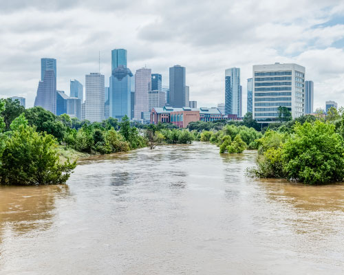 Flood waters with the City of Houston in the background