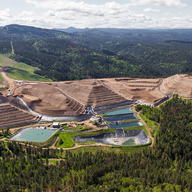 A copper mine uses water for their operations. Mining wastewater is collected in holding ponds that are often loaded with minerals causing water hardness
