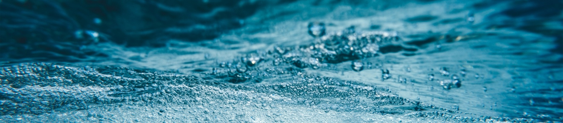 Blue water with droplets