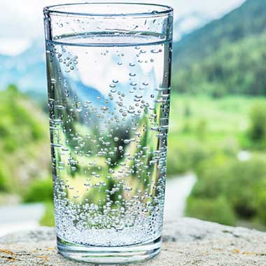 A glass of drinking water highlights the importance of monitoring ammonia in drinking water as it can cause issues of health, odor and taste.