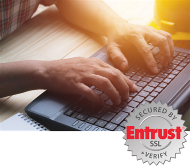 Person typing on keyboard at desk with Secured by Entrust SSL Verify seal