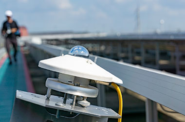 A close up image of a mounted Kipp & Zonen pyranometer used in a commercial Photovoltaic (PV) rooftop monitoring solution.