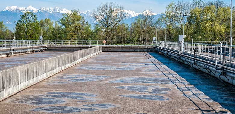 Low quality wastewater flowing through treatment process